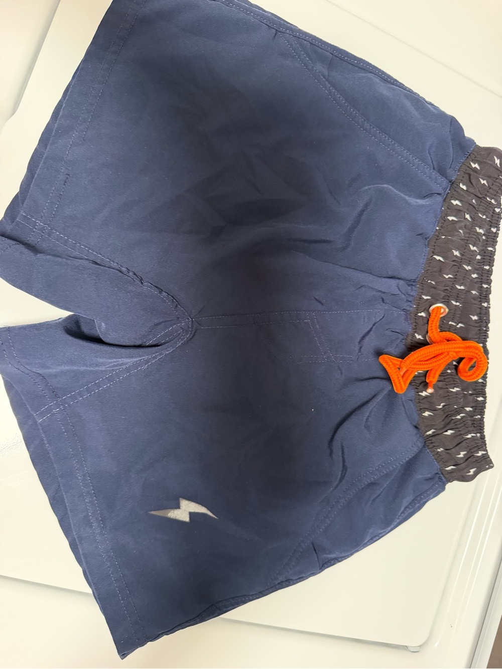 Boys Navy Bruce Bolt Shorts with Orange Drawstring and orange liner shorts